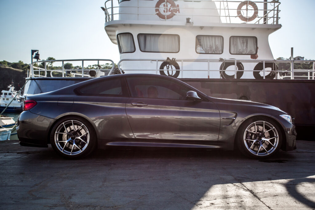 silver-luxury-sedan-parked-port